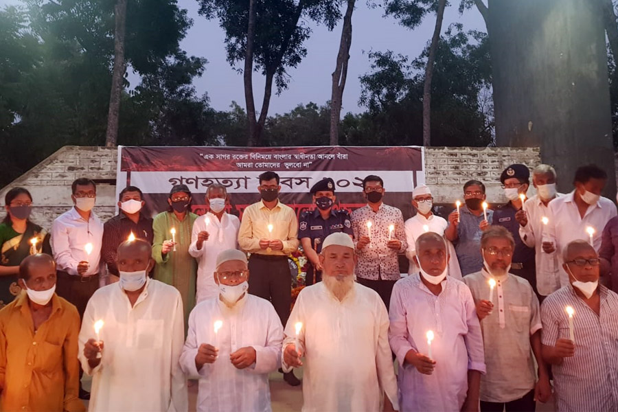 মোমবাতি জ্বালিয়ে রসুলপুর বধ্যভূমিতে মুক্তিযুদ্ধের শহীদদের স্মরণ